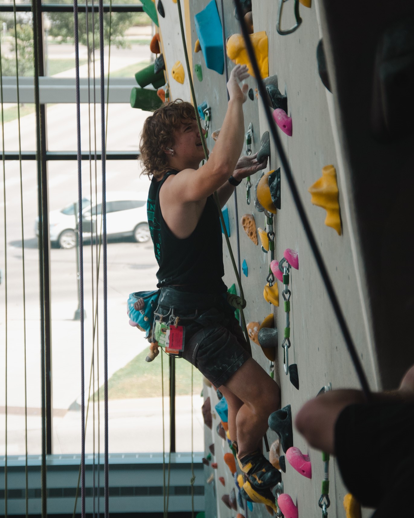 Team captain climbing on the high-wall