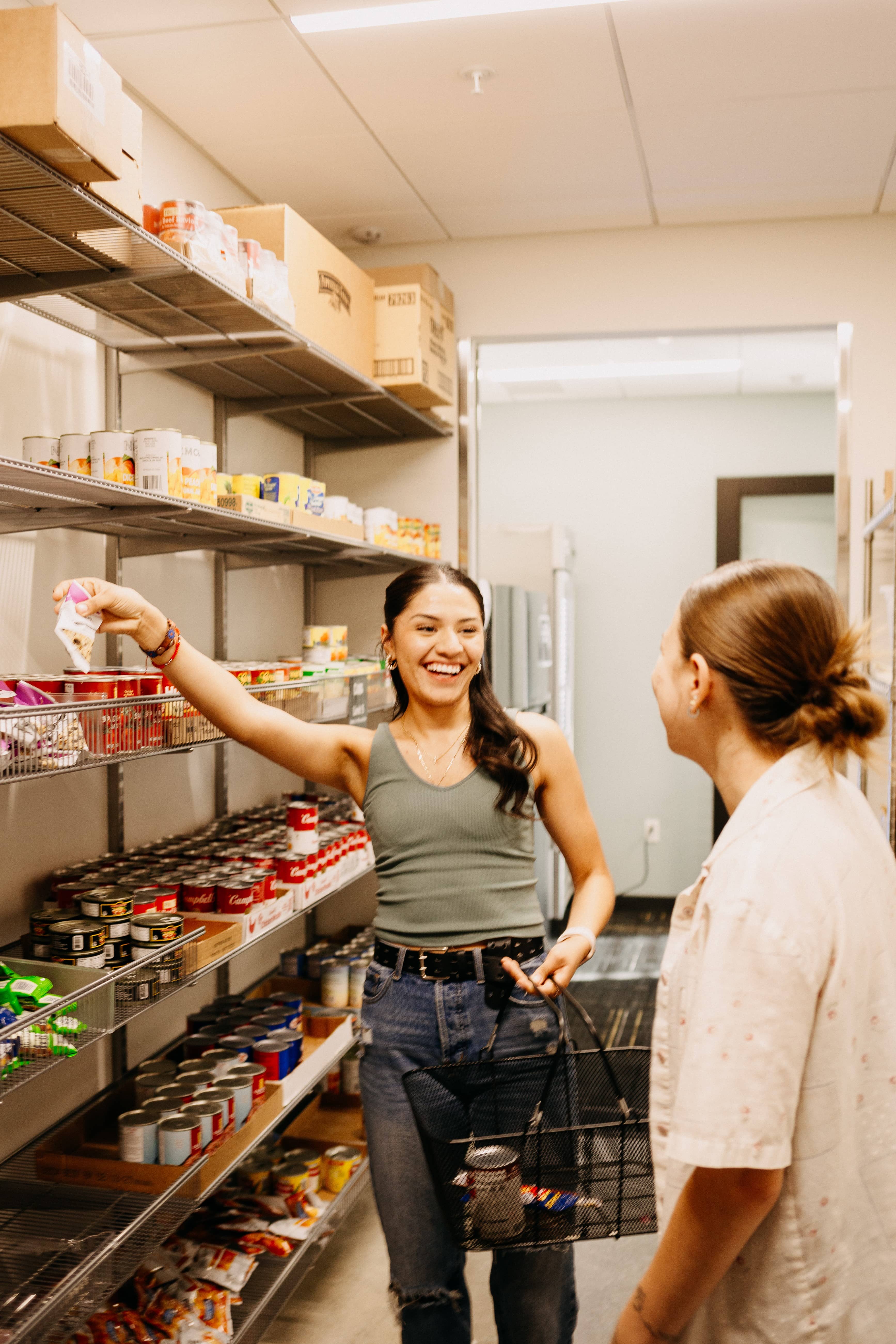 2 students in the food pantry