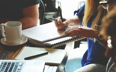 Image of people talking and working together