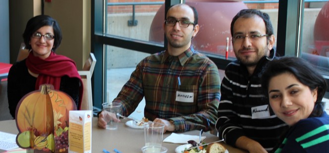 students having a Thanksgiving meal together