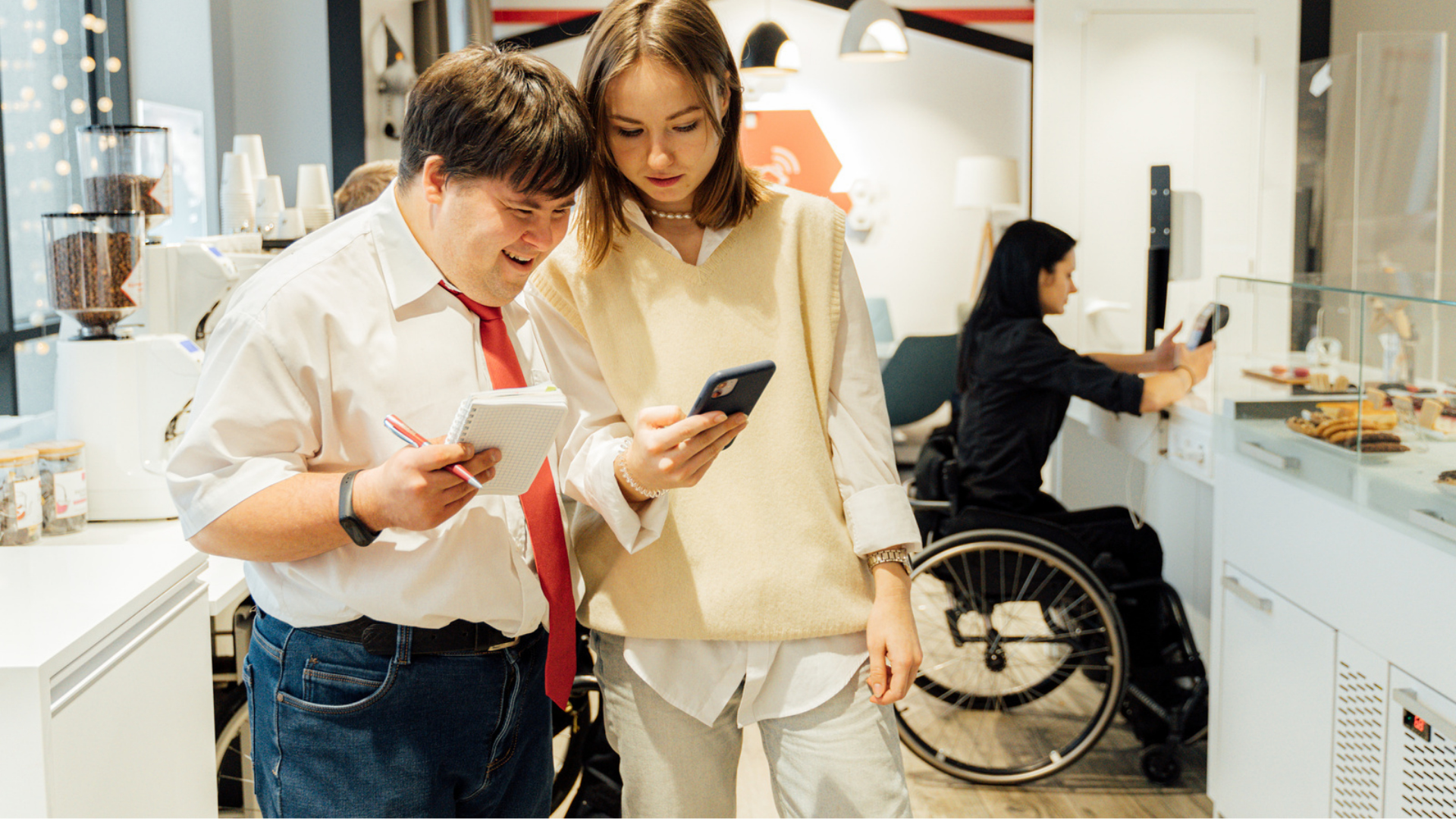 2024 Assistive Technology Expo. People with various disabilities look at phones or tablets.