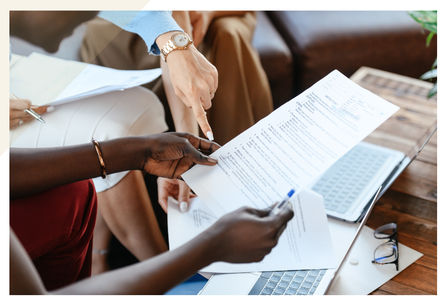 Someone holding and reading a document