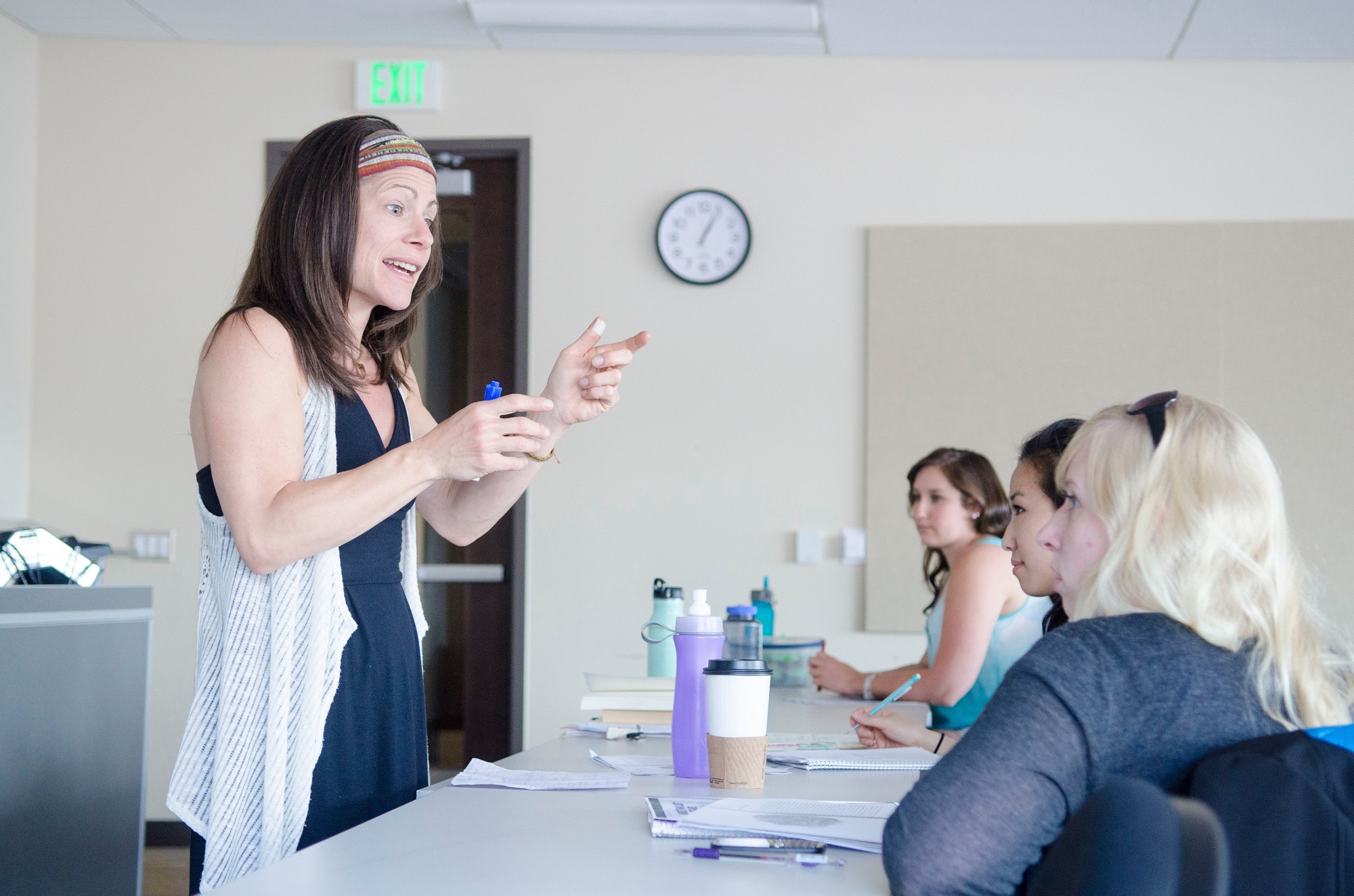 Teacher talking to students